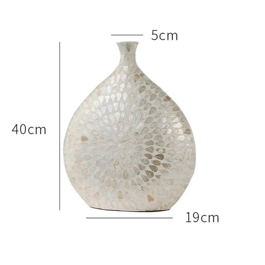 vaso de luxo; vaso decorativo; vaso de cerâmica; vaso artesanal; decoração sofisticada; peça exclusiva; materiais naturais; design contemporâneo.
